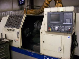 Okuma Cadet L1420 CNC LATHE, OSP 700L, 12 chk., Tail., Chip - powiększ zdjęcie