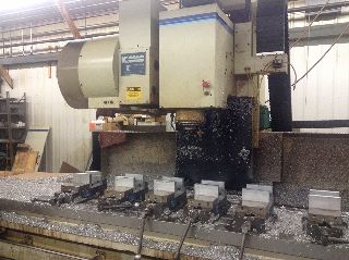 144 X Axis 24 Y Axis Komo VMC-40 VERTICAL MACHINING CENTER, Fanuc 16M Con - Haga clic para agrandar la imagen