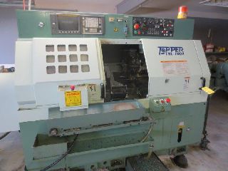 14.6 Swing 15.75 Centers Topper TNL-100A CNC LATHE, Fanuc 0T, Barfeed, Pa - Haga clic para agrandar la imagen
